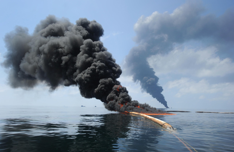 smoking oil tank on the ocean